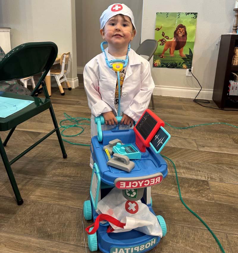 William Cervantes, now 3, playing dress-up as a health care provider. (Photo courtesy of the Cervantes family)